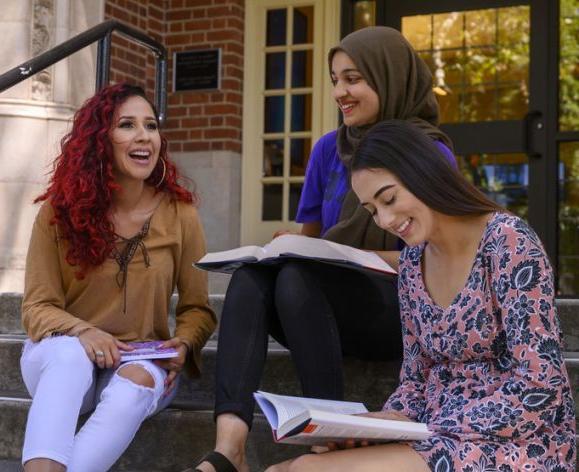 Sociology students Catalina Vasquez, left, with Brianna Rojas, right, and Rahila Shah